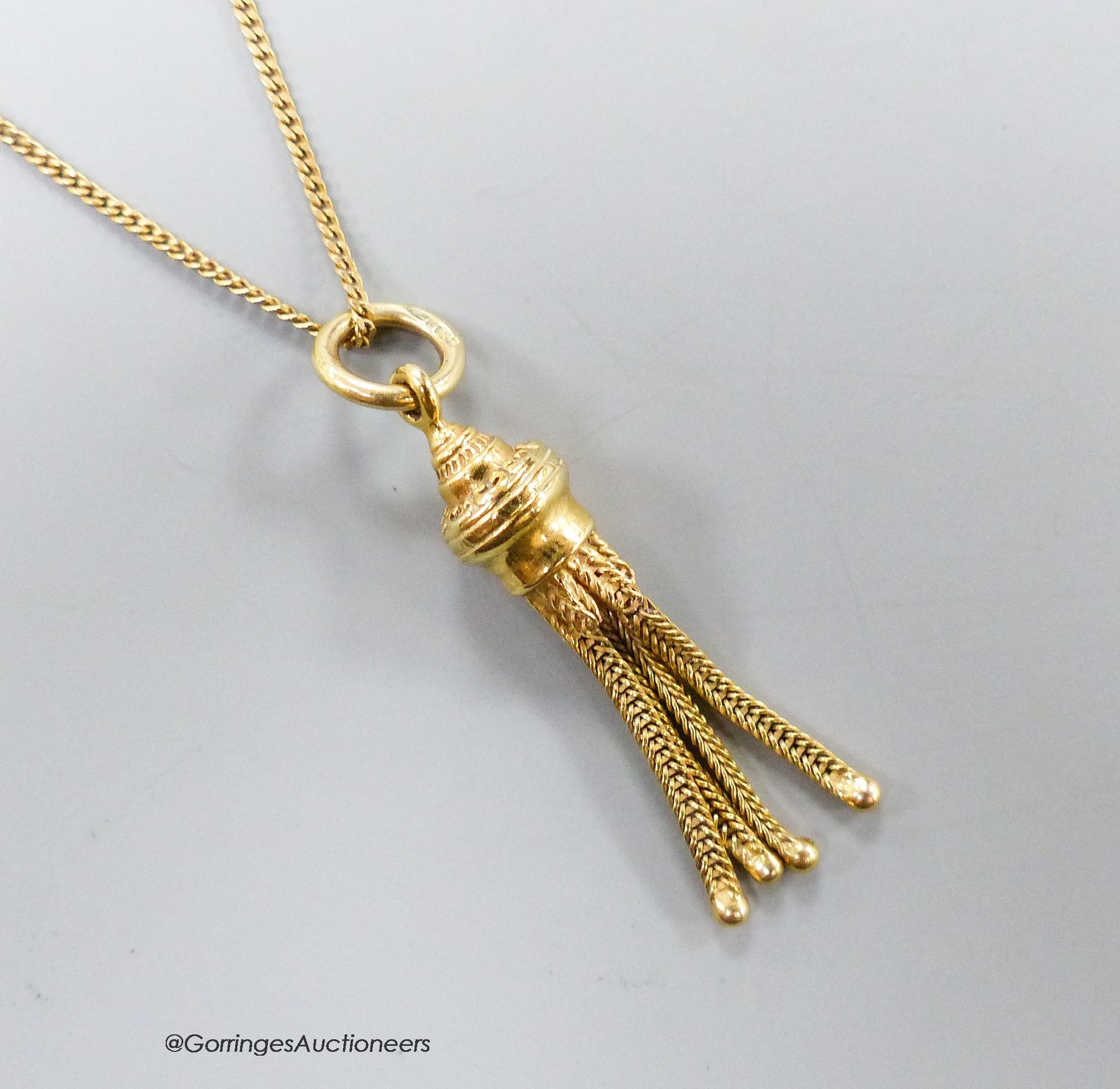 A 9ct gold tassel pendant on 9ct gold fine chain, 5.1 grams.